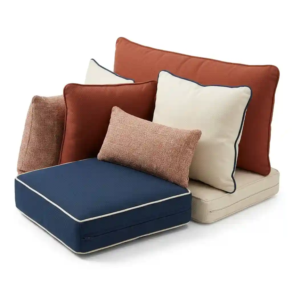 Outdoor Acrylic fabric cushions: navy blue seat cushion with white piping and rust and cream back cushions